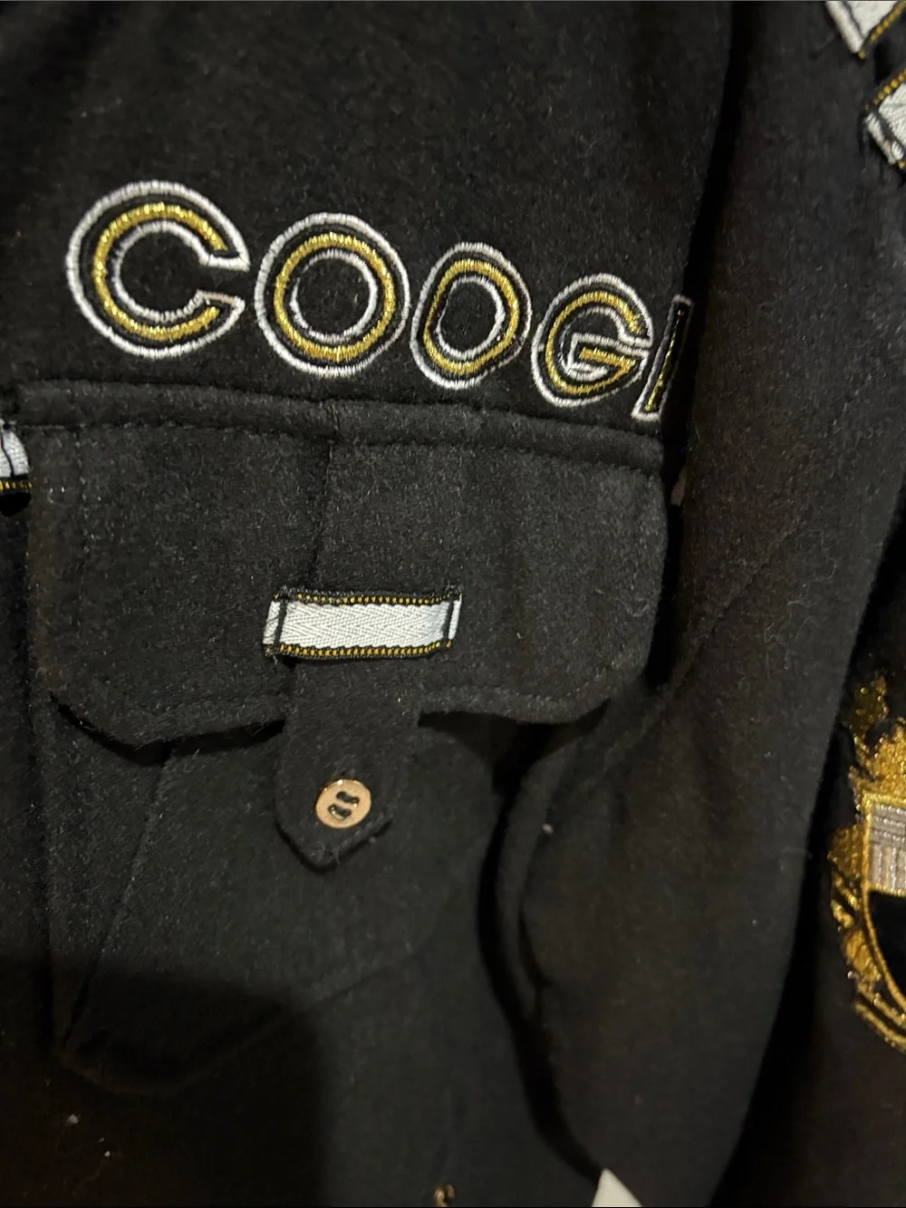 COOGI Black Bomber Jacket with Gold Trim and Crest